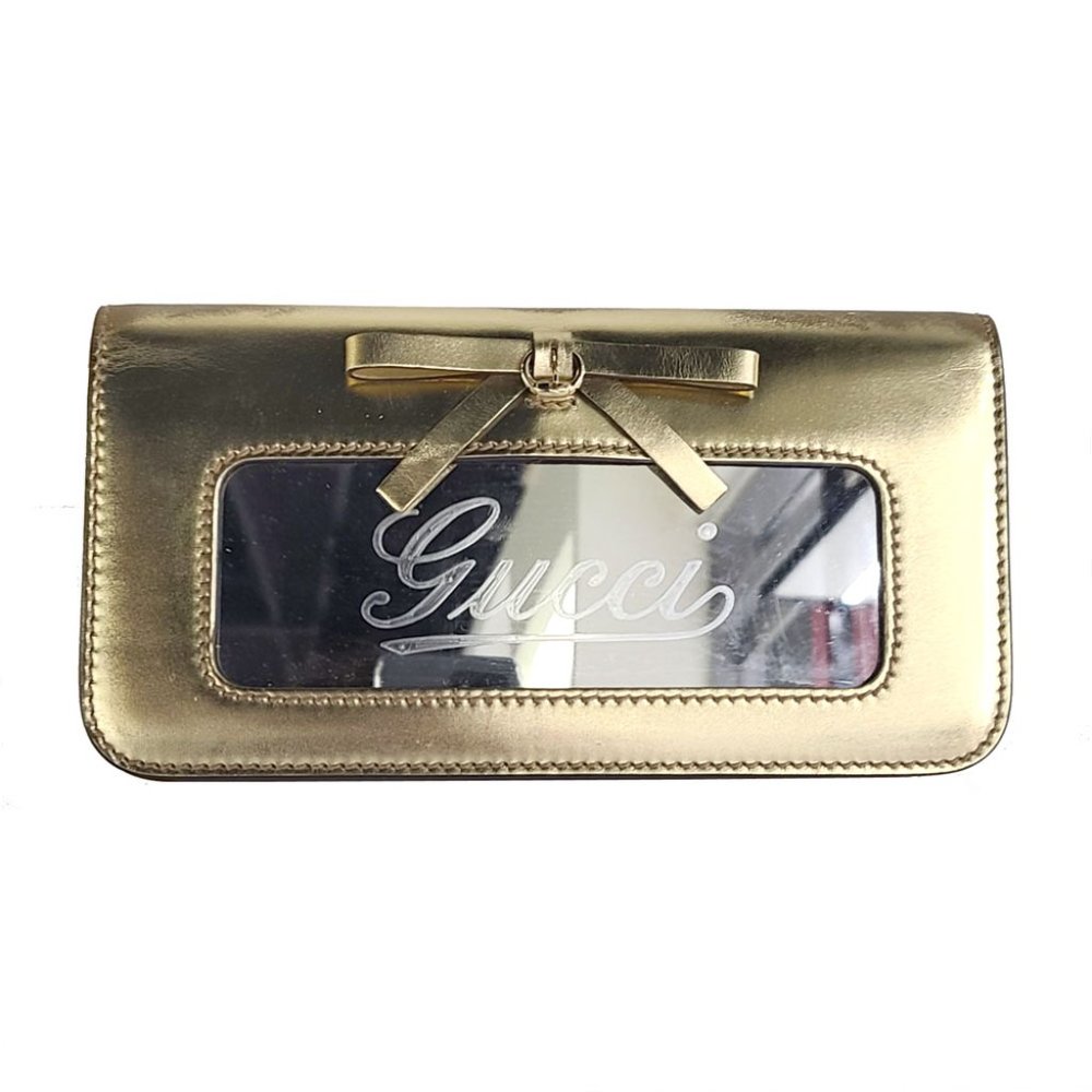 authentic GUCCI Leather Clutch Metallic Gold